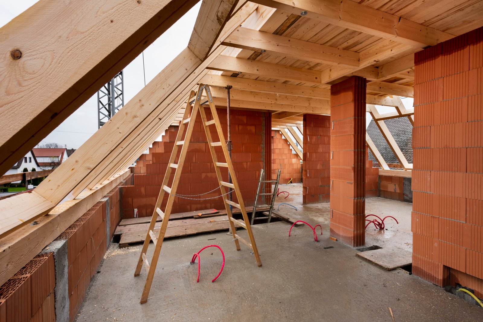 new house in construction with wooden roof